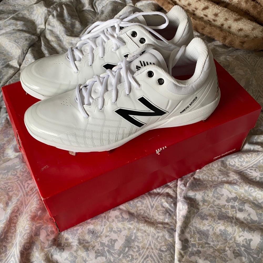 New Balance baseball cleats.